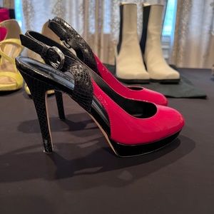 Karen Millen pink patent leather and black snakeskin platform heels.